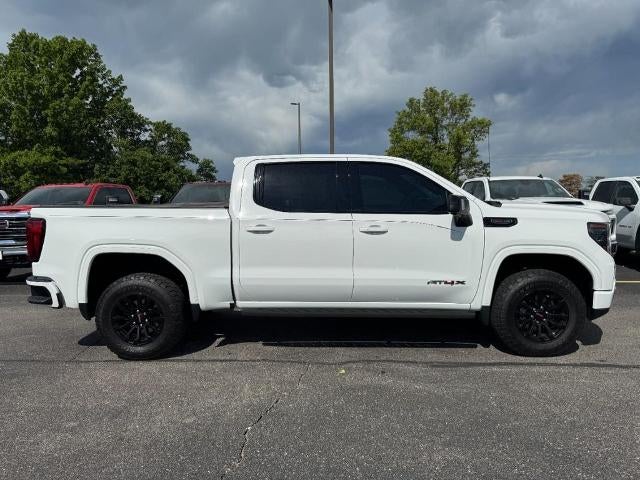 2022 GMC Sierra 1500 AT4X in Summit White — front three-quarter view